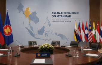 ASEAN Myanmar Talks Open New Dialogue ASEAN Myanmar talks illustrated with Philippine and ASEAN flags beside a diplomatic conference table.